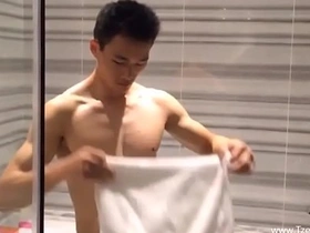 Handsome fitness enthusiast indulges in a sensual self-care routine, washing his muscular body and tantalizing viewers with his masculine scent. This Taiwanese jock's self-pleasure journey showcases his bisexual prowess.