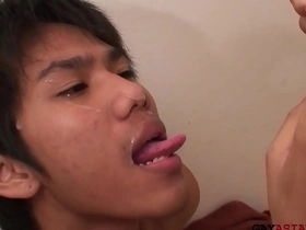 Asian twink duo kicks off their clothes and engage in steamy oral play. They then bareback each other, climaxing in a hot pissing session, culminating in a satisfying finish on their dripping cocks.