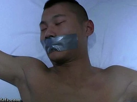 In the Straight Boyz BDSM series, a submissive Asian teen is bound and at the mercy of his dominant BDSM partners. Watch as they push him to his limits in a series of intense and erotic encounters.