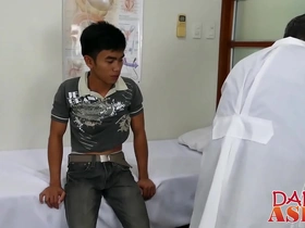 Young Asian twink visits the doctor, but things heat up when he's barebacked by a well-endowed patient. His skinny body writhes under the big cock, culminating in a messy cumshot.