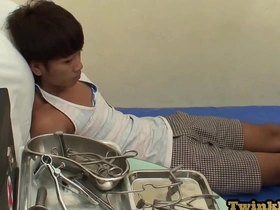 A petite Asian twink gets a check-up from a doctor in his ambulance, leading to a steamy encounter. The doc, abusing his power, forcibly barebacks the skinny lad, leaving him in ecstasy.