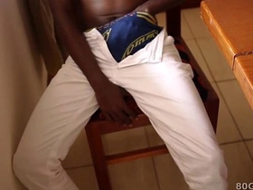 Kalem, a sizable black African twink, passionately pleasures himself, aiming for a massive cumshot. His eager hands work over his impressive member, delivering an exhilarating gay jack-off performance.
