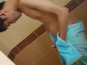 Steamy solo session with a smoking hot Asian twink who washes his hair and body, then gets down to business, stroking his thick, cut cock with expert precision. A scorching gay shower scene.