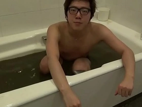 Japanese gay boy indulges in a steamy bath, sprinkling hikakin powder, creating a sensual, slippery environment. This amateur video on YouTube showcases his gay sex adventures, with explicit content.