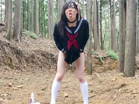Sissy Hiiya Sailor, a Japanese crossdresser, indulges in nostalgia while clad in a sailor uniform, toying with her femininity in a public park, culminating in a solo, intimate moment.