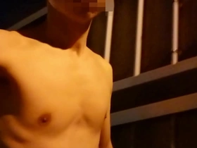 Soloboy from Japan takes a night stroll on a pedestrian bridge, flaunting his nude body. This exhibitionist enjoys the thrill of being seen, his heart racing with every step.