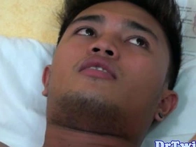 Asian twink patient gets his ass on the line for a steamy enema scene. Amateur doctor delivers a messy, bareback enema with gusto, using a variety of toys and objects for maximum pleasure.