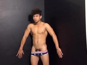 A Filipino lad eagerly fulfills his modeling duties, showcasing his skills in both frontal and oral aspects. This young, Asian twink impresses with his enthusiastic performance, catering to gay audiences.