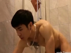 A muscular Asian hunk dominates with his big gay cock, delivering a thrilling handjob. His handsome face and chiseled physique make him the ultimate straight stud.